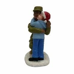 St. Nicholas Square® Village Child Hugging Hero -St. Nicholas Square Shop unnamed file 1994
