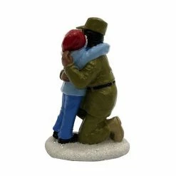 St. Nicholas Square® Village Child Hugging Hero -St. Nicholas Square Shop unnamed file 1995